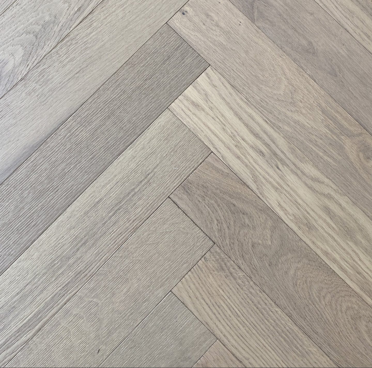 Herringbone Sand 12mm Laminated Flooring